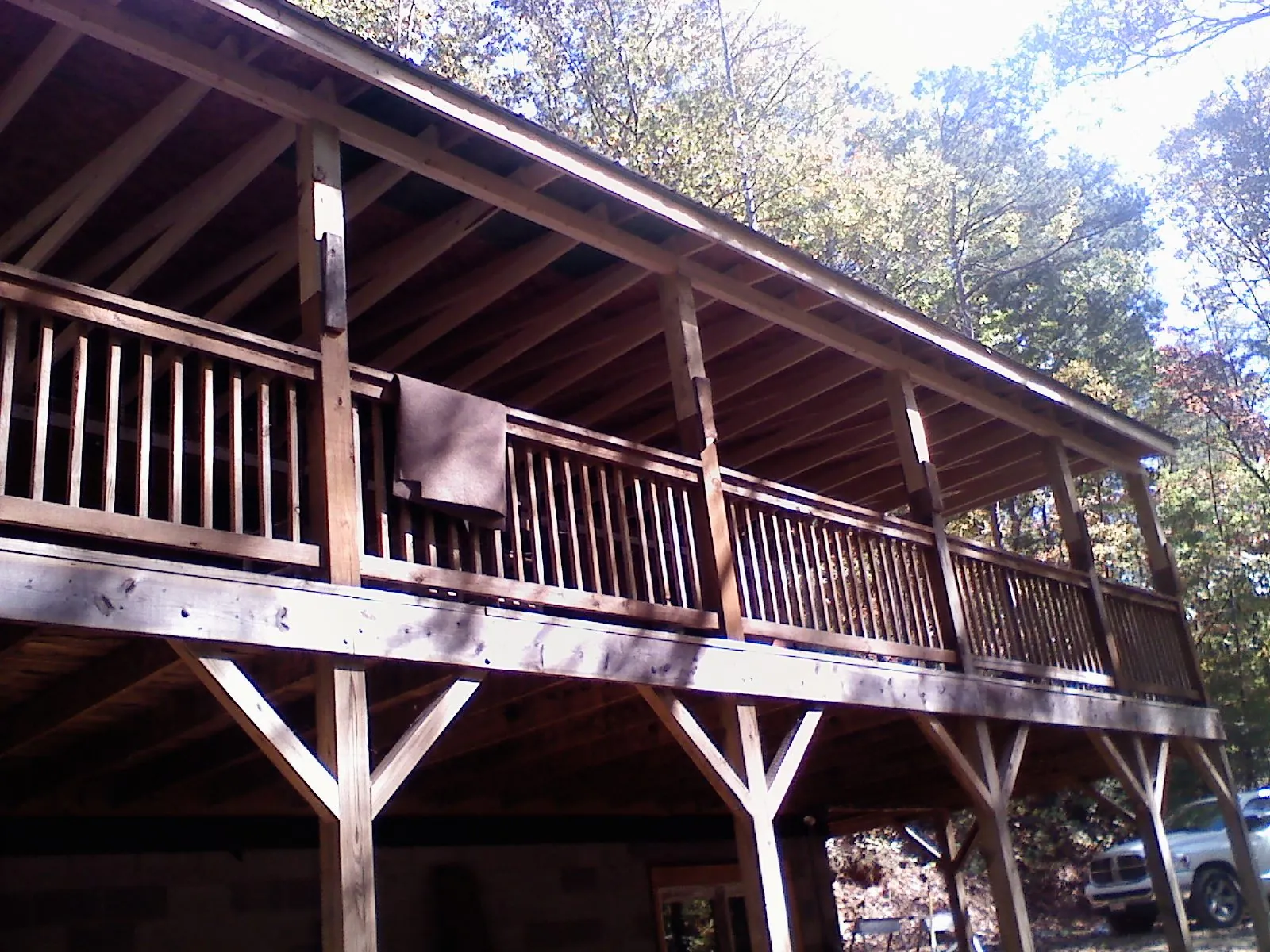 Timber framing under a new elevated porch and deck — Roof Leak Repair in Mapleville by Roofing Brothers